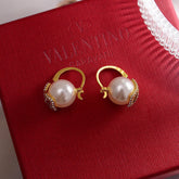 China Replica Valentino Earrings 22usd Only